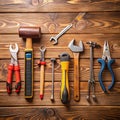 Assortment of Hand Tools Arranged on a Wooden Surface hardware construction Royalty Free Stock Photo