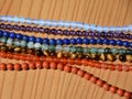 Collection of various mineral beads on thread