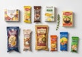 A collection of various packaged food products is displayed on a white surface. The packages come Royalty Free Stock Photo