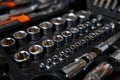 A collection of various sockets and wrenches gathered in a box Royalty Free Stock Photo