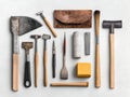 A collection of various vintage hand tools arranged neatly on a surface for display or artistic purposes Royalty Free Stock Photo