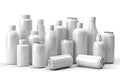 Collection of various white plastic bottles and aluminum cans arranged on a plain background Royalty Free Stock Photo