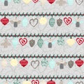 Collection of vintage christmas ornements hanging on holly garlands seamless pattern background.