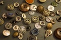 Collection of vintage clothing buttons. Dark stone background, grunge photo. Royalty Free Stock Photo