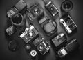 Collection Vintage Film And Digital Cameras, On Black Background, Top View