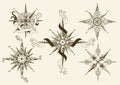 Collection of vintage nautical compass. Old vector design elements for marine theme and heraldry. Hand drawn wind roses Royalty Free Stock Photo