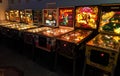 Collection of vintage pinball machines in arcade