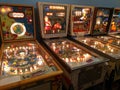 Collection of vintage pinball machines in arcade