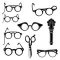 A collection of vintage and retro spectacles with scissors and a decorative handle in black and white silhouette art isolated on Royalty Free Stock Photo