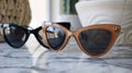 A collection of vintage sunglasses featuring retro cateye shapes and round frames paying homage to the enduring Royalty Free Stock Photo
