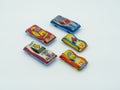 Collection of vintage tin toy cars. Antique small race cars in different colors