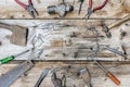 Collection of vintage woodworking tools on a rough workbench and