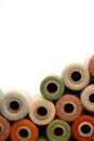 Collection of Vintage Yarn Spools Frame White Background Royalty Free Stock Photo