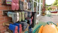 A collection of Wellingtons on a boot rack outside a nursery school