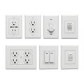 Collection of White Electrical Outlets and Light Switches on White Background power outlet Royalty Free Stock Photo