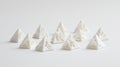 A collection of white, geometric objects arranged in a circular pattern on a white background. Royalty Free Stock Photo
