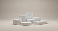 Collection of white geometric podiums and blocks on neutral background display stage Royalty Free Stock Photo