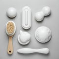 A collection of white massage tools arranged against a light gray background. The Royalty Free Stock Photo