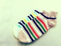 Collection of white and pink colored socks with vintage filters effect