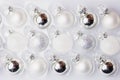 Collection of white and silver christmas balls in a box Royalty Free Stock Photo