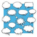 A collection of white speech bubbles on a blue background Royalty Free Stock Photo