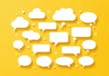 Collection of white speech bubbles and thought clouds on a bright yellow background Royalty Free Stock Photo