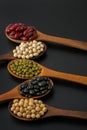 Collection of whole grains seeds isolated on black background. Royalty Free Stock Photo