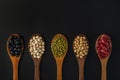 Collection of whole grains seeds isolated on black background. Royalty Free Stock Photo