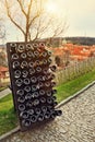 Collection wines aging in the rack outdoors against old town Prague Royalty Free Stock Photo