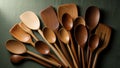 Assortment includes various spoons spatulas and turners crafted from wood in Royalty Free Stock Photo