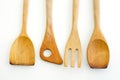 A collection of wooden kitchen utensils isolated on white background Royalty Free Stock Photo