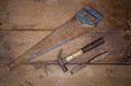 Collection of woodworking old handtools on a rough workbench wooden Royalty Free Stock Photo