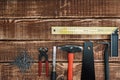 Collection of woodworking tools on a wooden background and copy space: carpentry, craftsmanship and handmade concept, Royalty Free Stock Photo