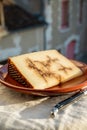 Collection of world cheeses, matured Spanish Sheep Cheese with Black Garlic