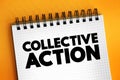 Collective action - when a number of people work together to achieve some common objective, text concept on notepad Royalty Free Stock Photo