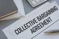 Collective Bargaining Agreement is shown using the text as legal concept Royalty Free Stock Photo