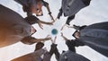 College alumni students toss a globe of the world into the sky. Royalty Free Stock Photo