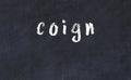 College chalk desk with the word coign written on in