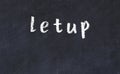 College chalk desk with the word letup written on in Royalty Free Stock Photo