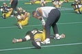 College football player doing pre-game stretch at the Army vs. Lafayette game, Michie Stadium, New York Royalty Free Stock Photo