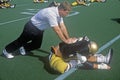 College football player doing pre-game stretch at the Army vs. Lafayette game, Michie Stadium, New York Royalty Free Stock Photo