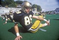 College football player doing pre-game stretch at the Army vs. Lafayette game, Michie Stadium, New York Royalty Free Stock Photo