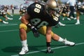 College football player stretching Royalty Free Stock Photo