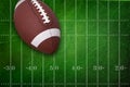 College football on textured field backgrou Royalty Free Stock Photo