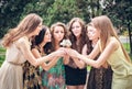 College Girls Blowing Dandelion Seeds Royalty Free Stock Photo