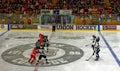 college hockey game face off center ice rink