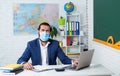 college lecturer on coronavirus pandemic. back to school. nonformal education. mature teacher wear respirator mask Royalty Free Stock Photo