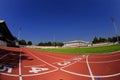 College Level football stadium with racetrack Royalty Free Stock Photo