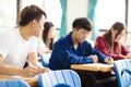 College student cheating during exam Royalty Free Stock Photo