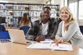 College Student Has Individual Tuition From Teacher In Library Royalty Free Stock Photo